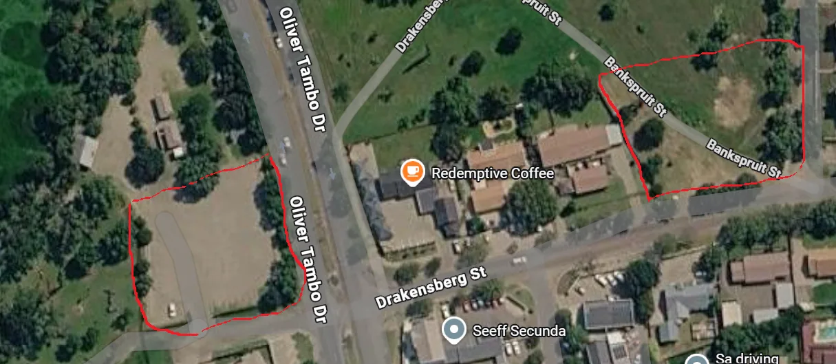 Map of the two parking areas near Redemptive Coffee, marked in red